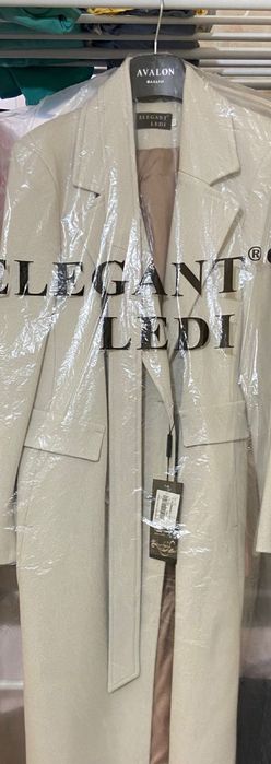 Новый пальто продам