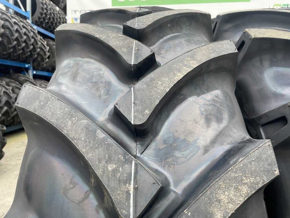 15.5-38 anvelope noi cu 12 pliuri pt tractor spate U650 marca OZKA