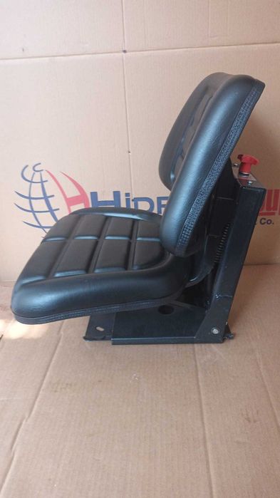 Scaun universal cu reglaj si amortizor pentru tractor