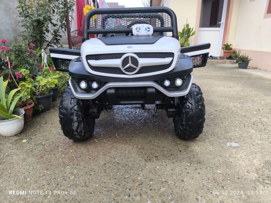 Mașinuță electrică.