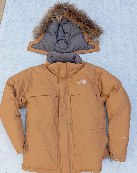 Vând  geaca umpluta puf gasca  T.N.Face!