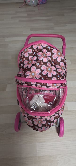 Cărucior păpuși roz