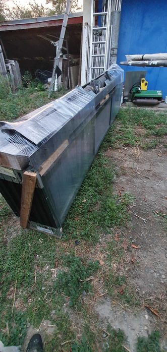 Vand porti,usi sectionale industriale 4x4m vitrate electrice HildTore.