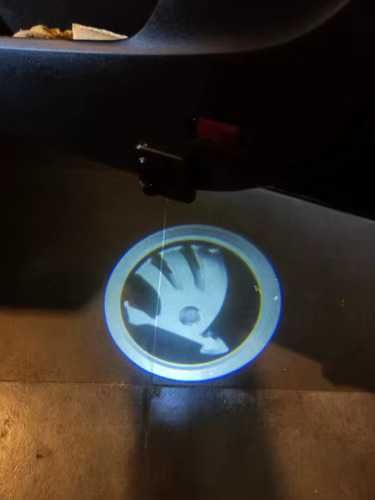Proiector logo Skoda portiere