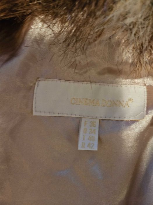 Комплект от пухкав елек и гети