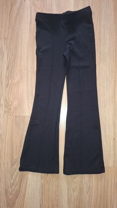 Pantaloni fete ,evazați,in stare buna,mărimea 140cm
