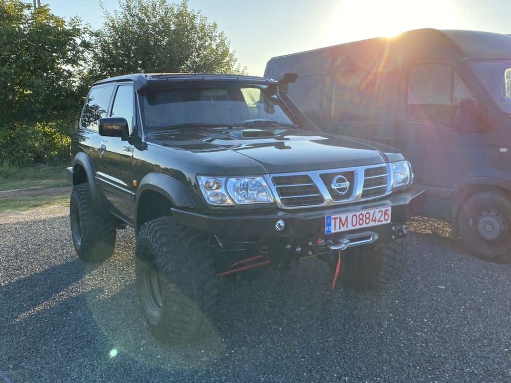 Bara fata Nissan Patrol Y61 cu suport de troliu