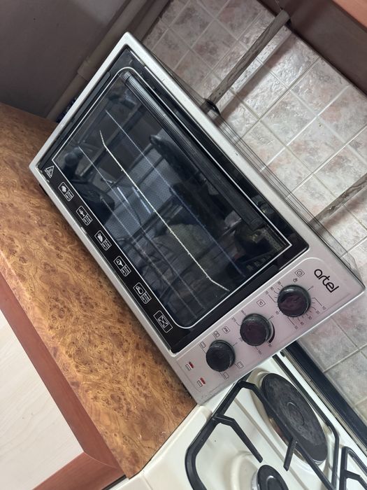 Продам мини электропечь Artel
