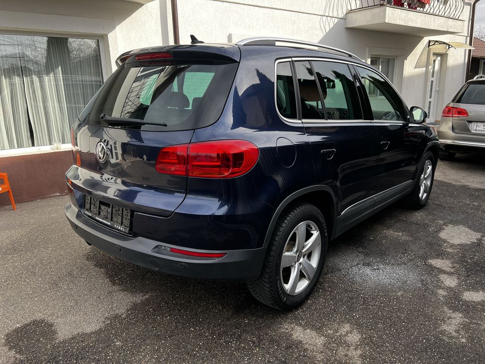 VW-Tiguan  2.0 -2014