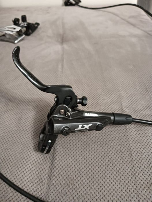 Frana fata shimano xt + sc.himbător shimano xt spate cu maneta amândou