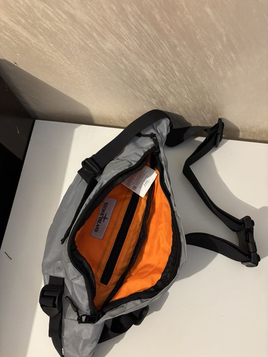 Stone island silver reflective bag
