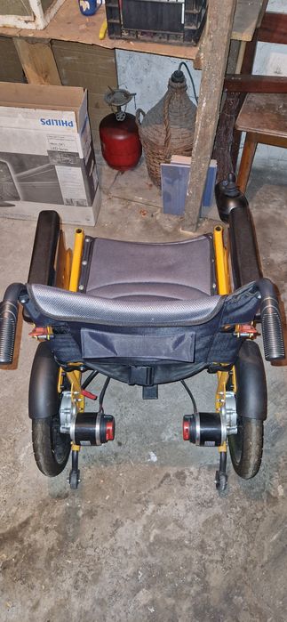 Cărucior electric pentru deplasare persoane cu dizabilități