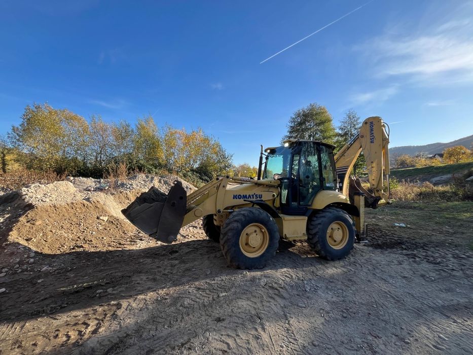 Vând buldoexcavator komatsu wb93s
