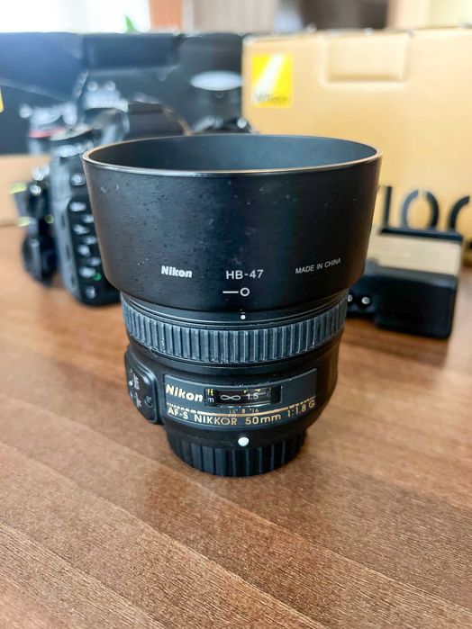 Pachet Nikon D7100 (13.000 cadre) cu obiective portret (35mm, 50mm)