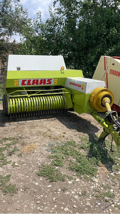Presa de baloti ( balotat ) Claas Markant 65 , 51, Welger , John Deere