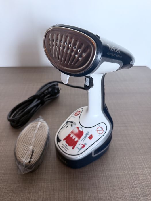 Vând aparat de calcat vertical TEFAL