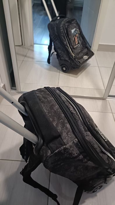 Ghiozdan troler pentru copii și combinezon copil