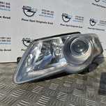 Far stanga cu lupa Volkswagen Passat B6 3C