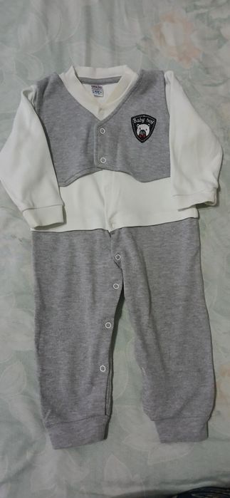 Продам тёплые комбинезон для новорождённого