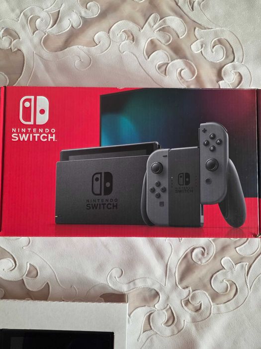Vand Nintendo Switch + husa + 4 jocuri