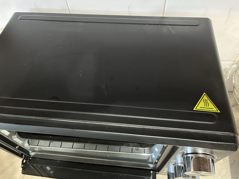 Электропечь  QLT , компактная.Новая.