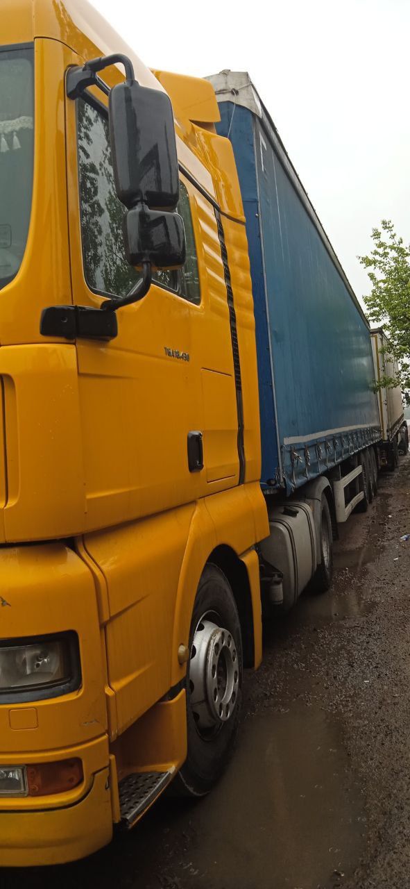 Продается SHCMITZ S01 с полуприцеп универсал MAN TGA 18430 4x2 BLS
