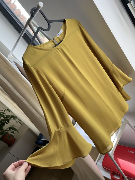 Motivi cămașă/bluza în stare perfectă.