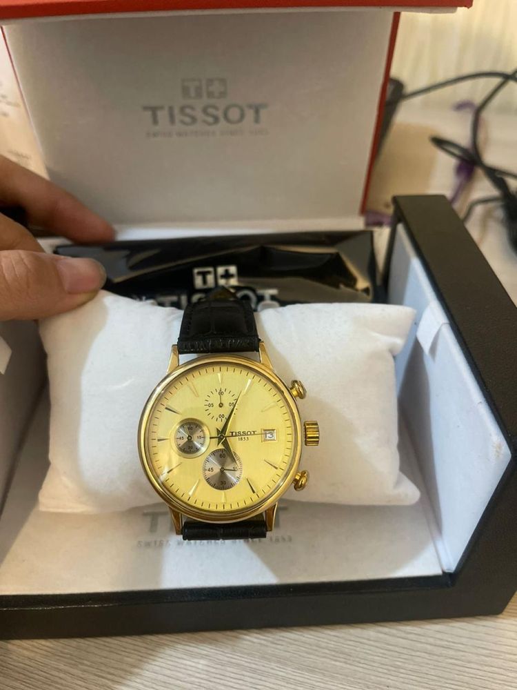 Золотые часы Tissot