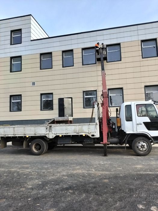 Манипулятор и автовышка услуги