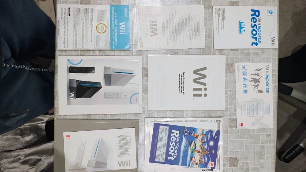 Nintendo wii в отлично състояние с 13 игри и много аксесоари