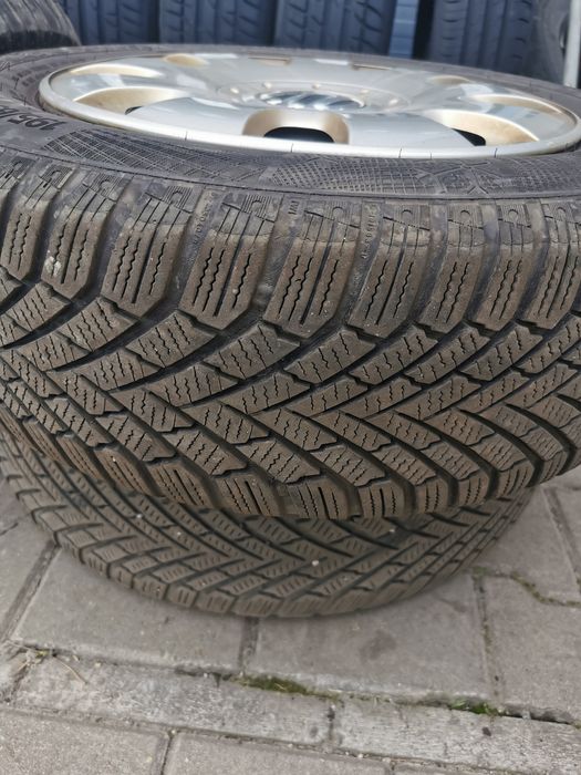 Jante de tabla pe 15'cu capace si cauciucuri continental de iarna