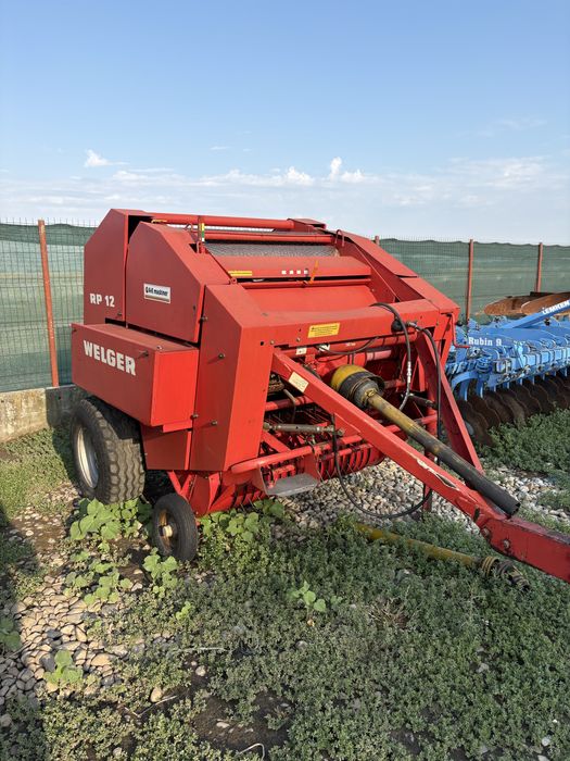 Presa de balotat , balotiera rotundă Claas Rollant 46 , Welger , Deutz