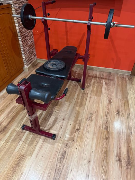 Лежанка със лост и тежести