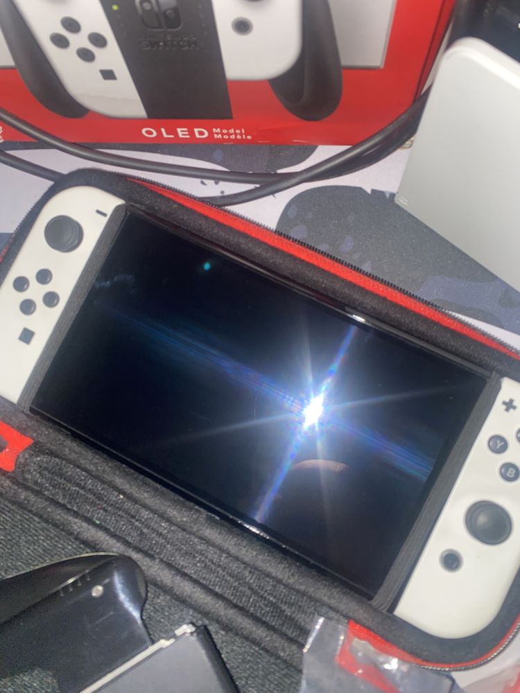 Nintendo Switch OLED white с 12 игри и твърд калъф