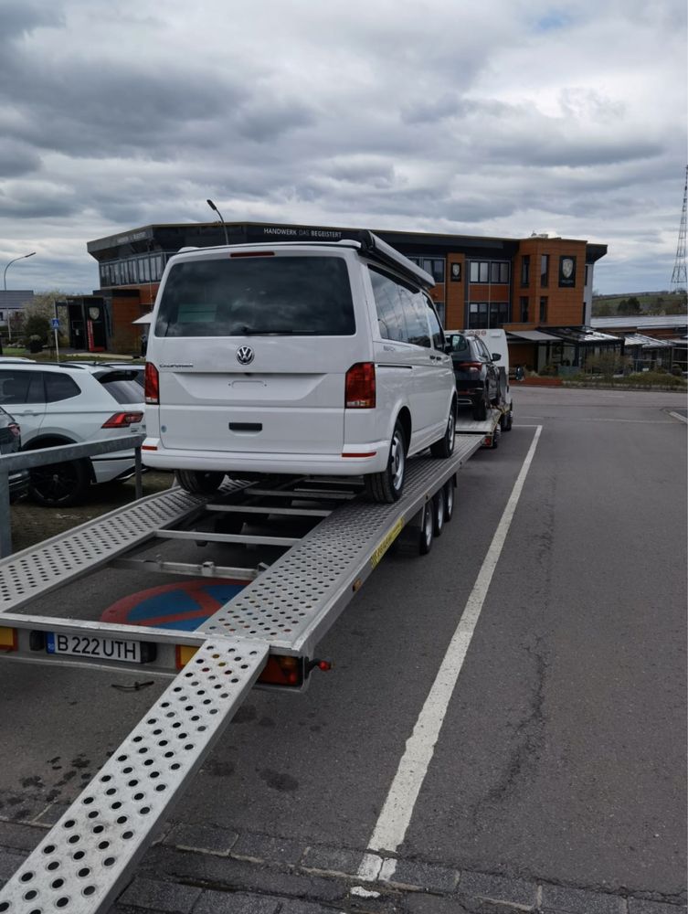 Transport/tractari auto cu platforma Germania Olanda Belgia Romania