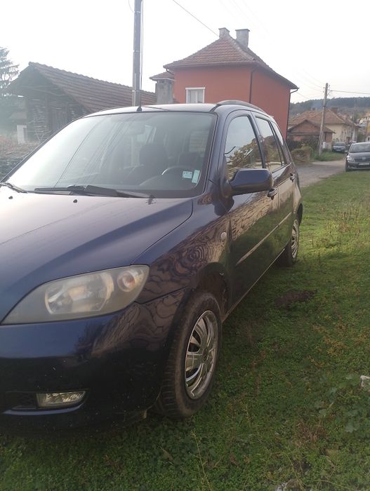 Мазда 2 1.4 бензин/газ