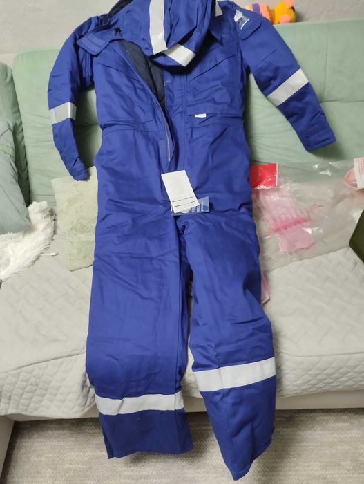 Продам зимний комбинезон размер М