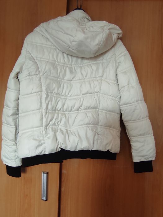 Женские фирменные куртки.