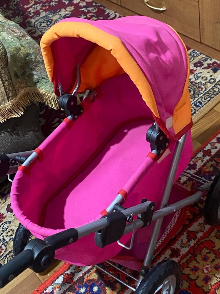 детская розовая коляска