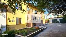 Casa renovata 200mp pe 2 niveluri,parcare, curte cu foisor,Centru, str