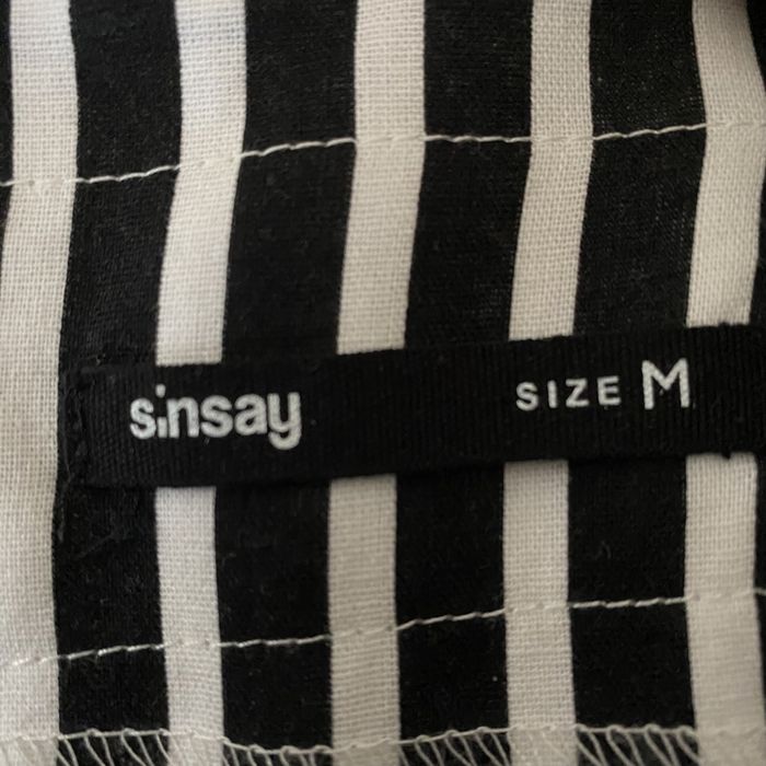 Fusta Sinsay cu buzunare si curea