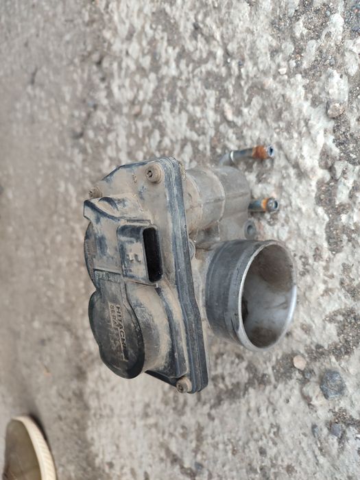 Продам дроссельную заслонку на Ниссан Кашкай, j10