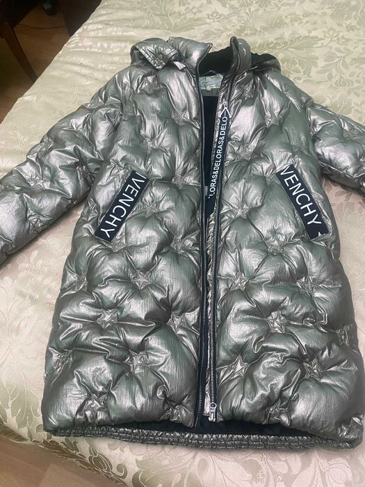 Продаю пуховик женский