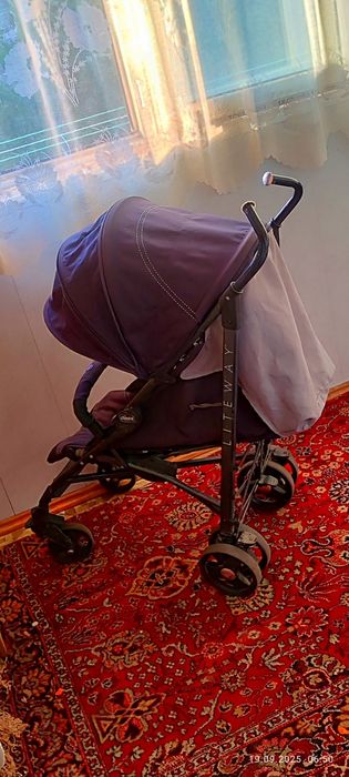 Удобная и лёгкая коляска Chicco