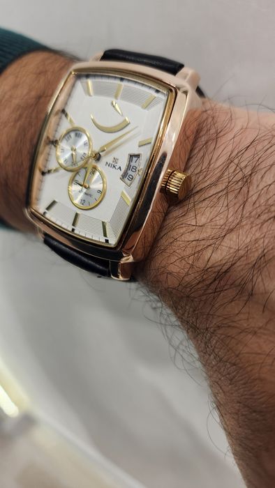 Золотые часы Ника