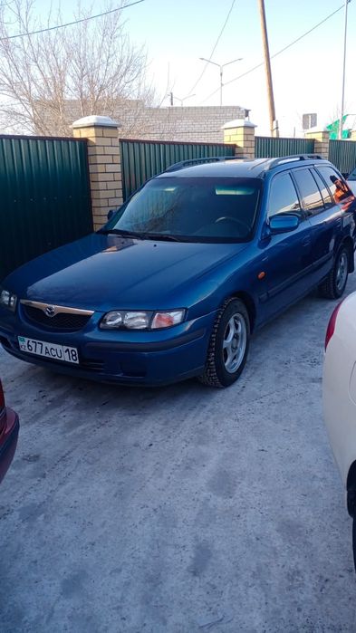 Мазда 626 птичка