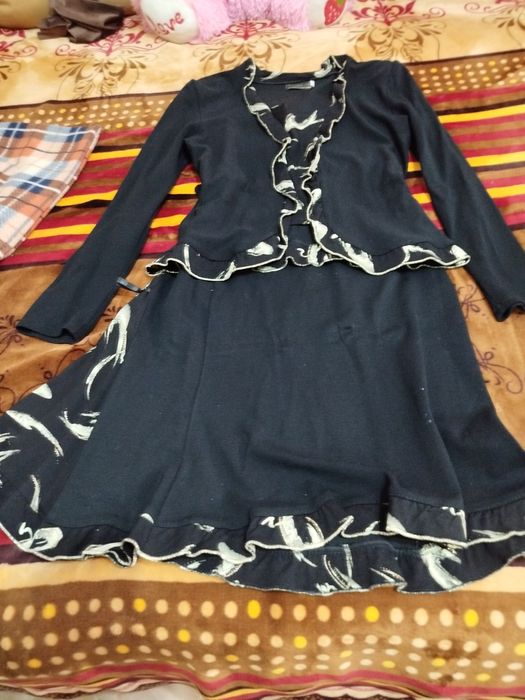 Одежда женская , платья и красивый костюм