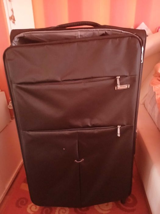 Почти нов куфар за цялото семейство