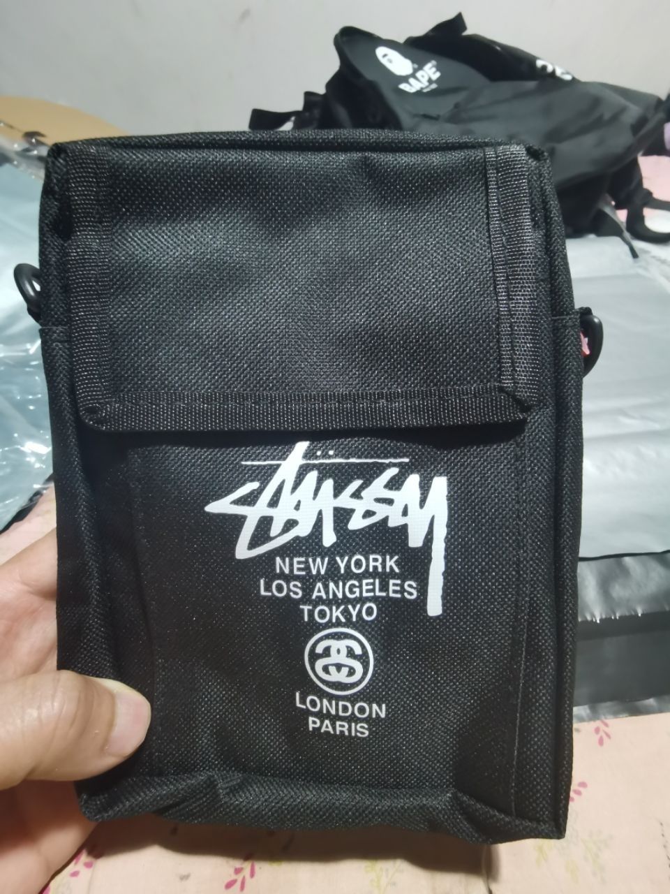 Барсетка от бренда Stussy