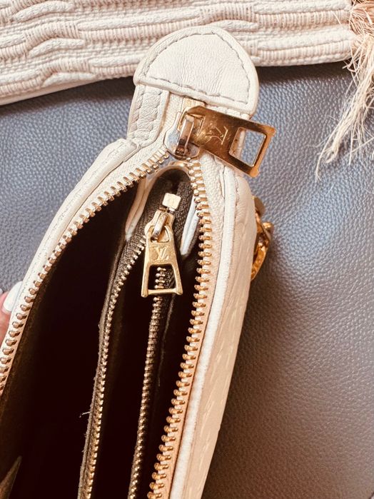 Louis Vuitton Couissin PM bag